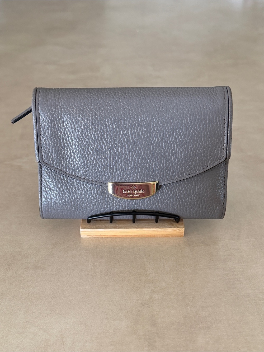 Kate Spade Pebbled Leather Gray Wallet with Gold Hardware. (Like new!)